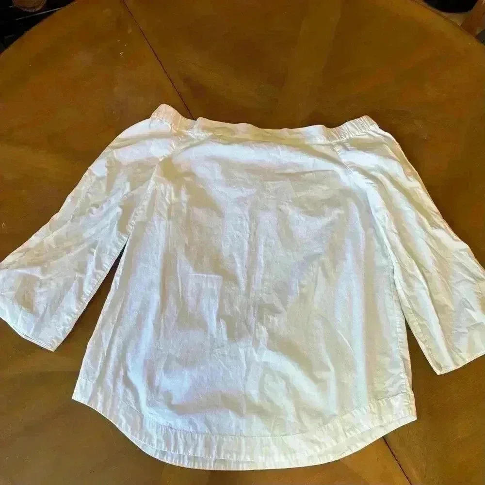 Free People size top size medium off the shoulder knot ties on the sleeves